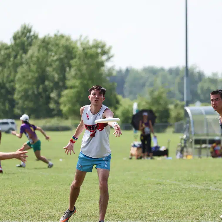 An Ultimate player throws a perfect pass